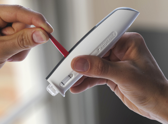 close up of needle free device being used