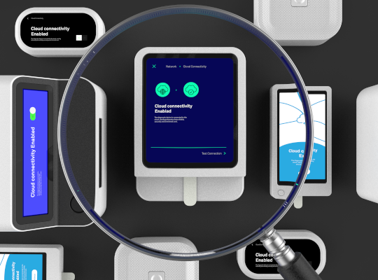graphic of magnifying glass examining diagnostic devices
