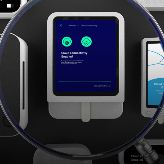 graphic of magnifying glass examining diagnostic devices
