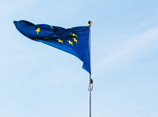eu flag flying with blue sky background